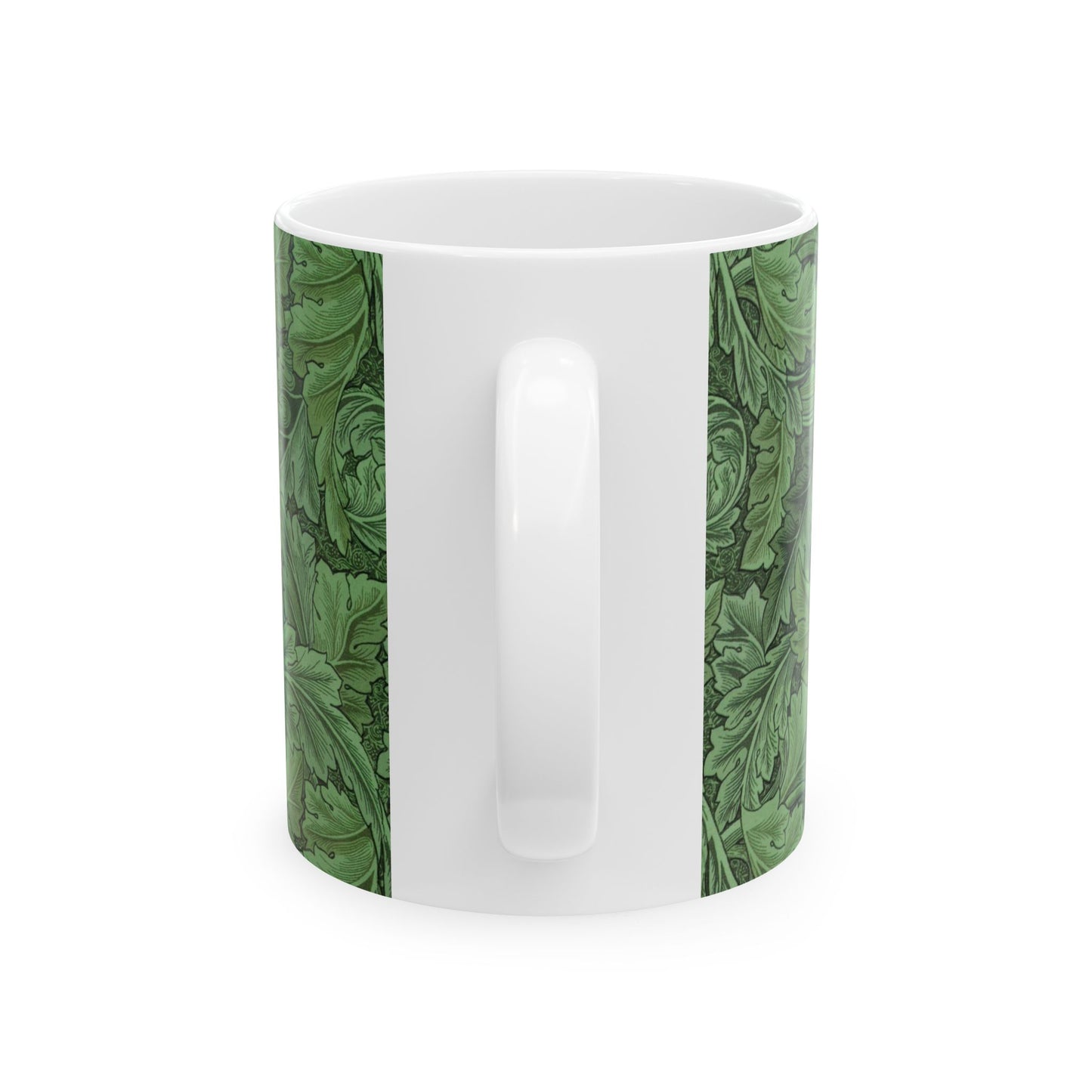 A ceramic mug with a green and white leaf pattern inspired by William Morris - Acanthus Collection.