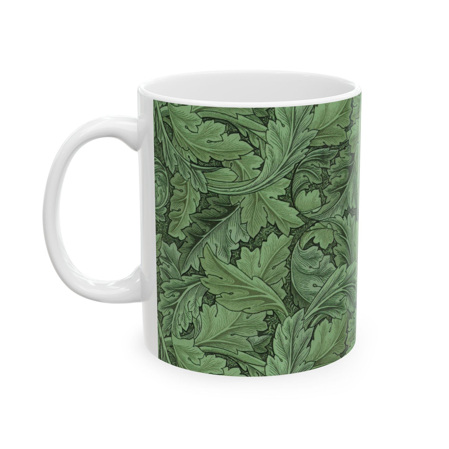 A ceramic mug with a green and white leaf pattern inspired by William Morris - Acanthus Collection.