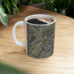 A ceramic mug with a floral pattern inspired by William Morris - Acanthus Collection in a grey colour.
