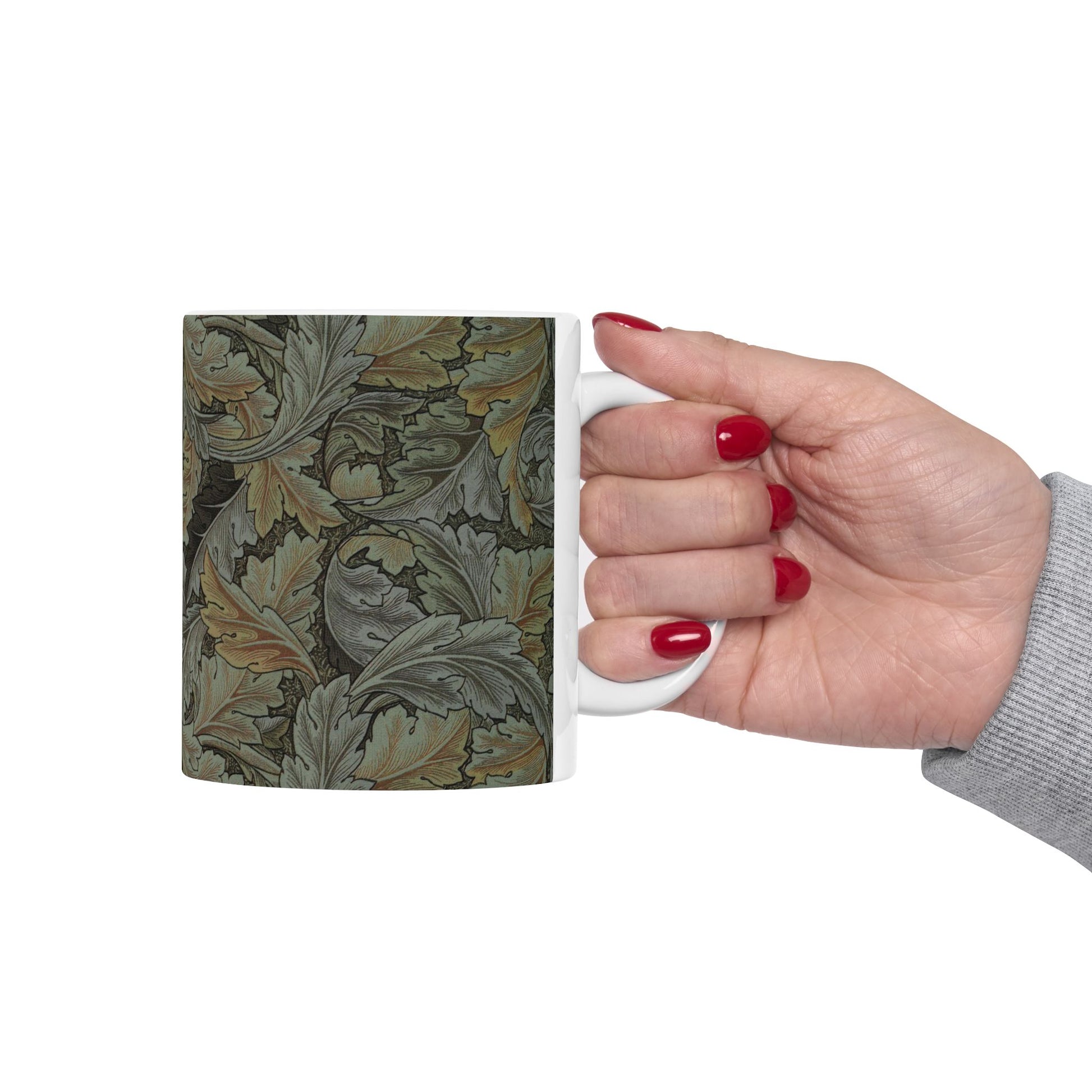 A ceramic mug with a floral pattern inspired by William Morris - Acanthus Collection in a grey colour.