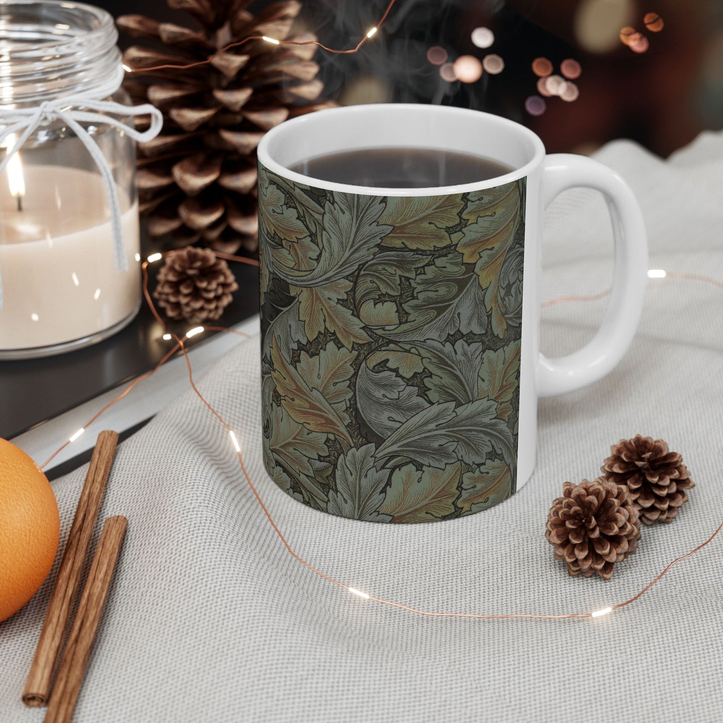 A ceramic mug with a floral pattern inspired by William Morris - Acanthus Collection in a grey colour.