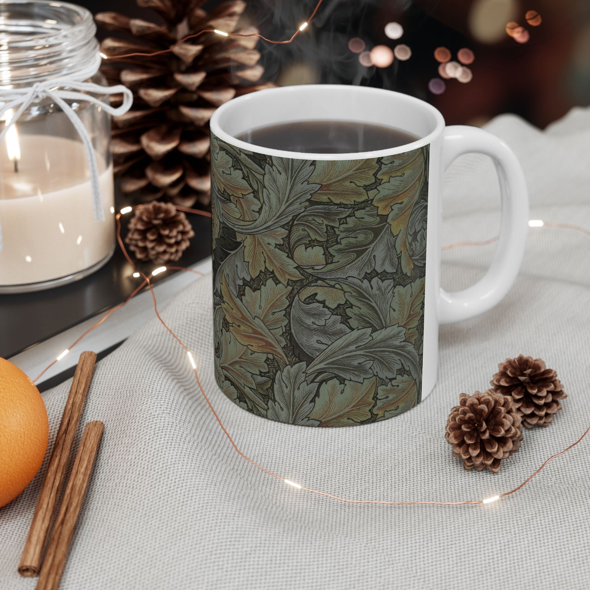 A ceramic mug with a floral pattern inspired by William Morris - Acanthus Collection in a grey colour.