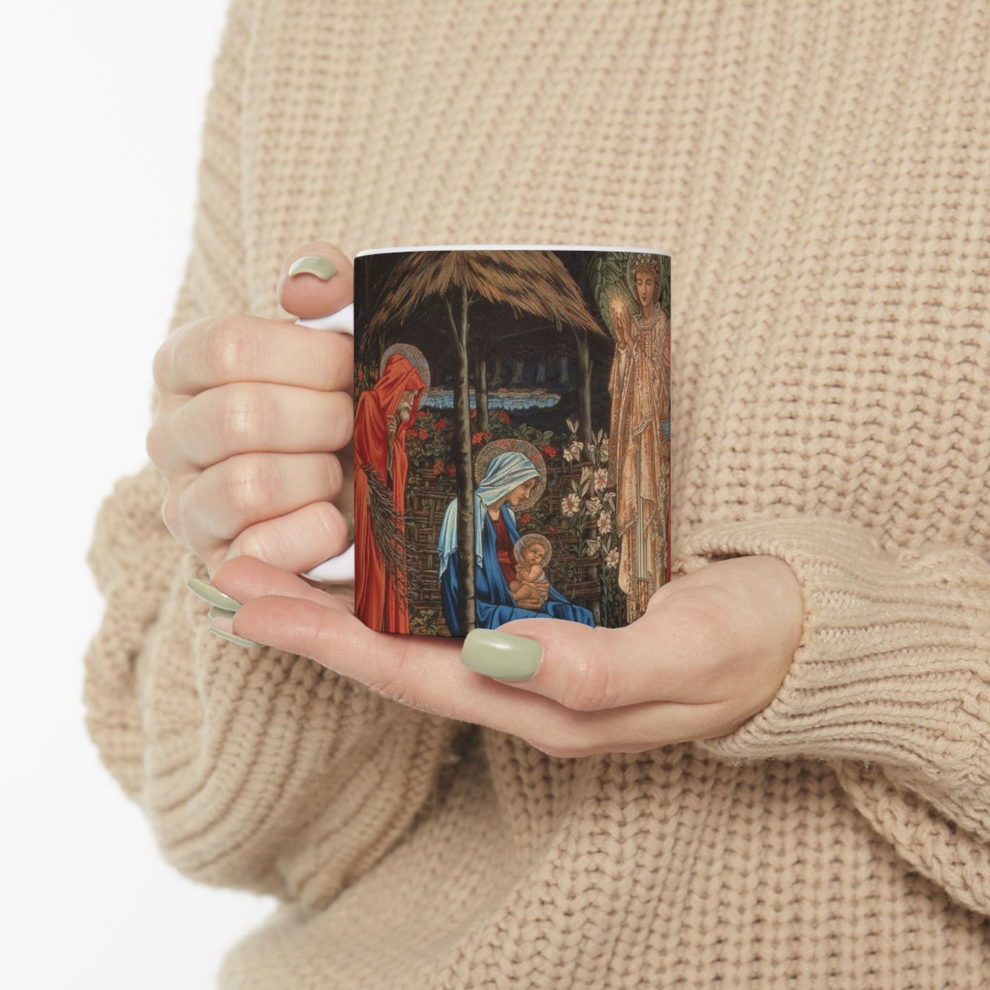 A ceramic mug with a William Morris-inspired design featuring figures in medieval attire.