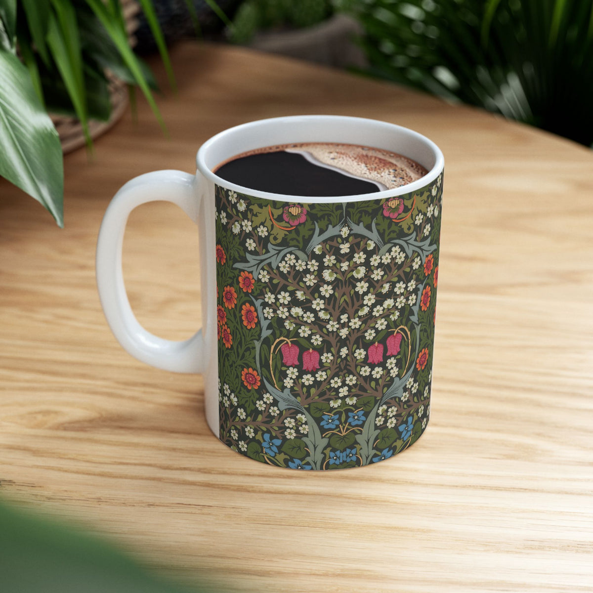 Ceramic Mug designed by William Morris & Co in a green, white and pink floral pattern called Blackthorn Collection