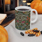 Ceramic Mug designed by William Morris & Co in a green, white and pink floral pattern called Blackthorn Collection