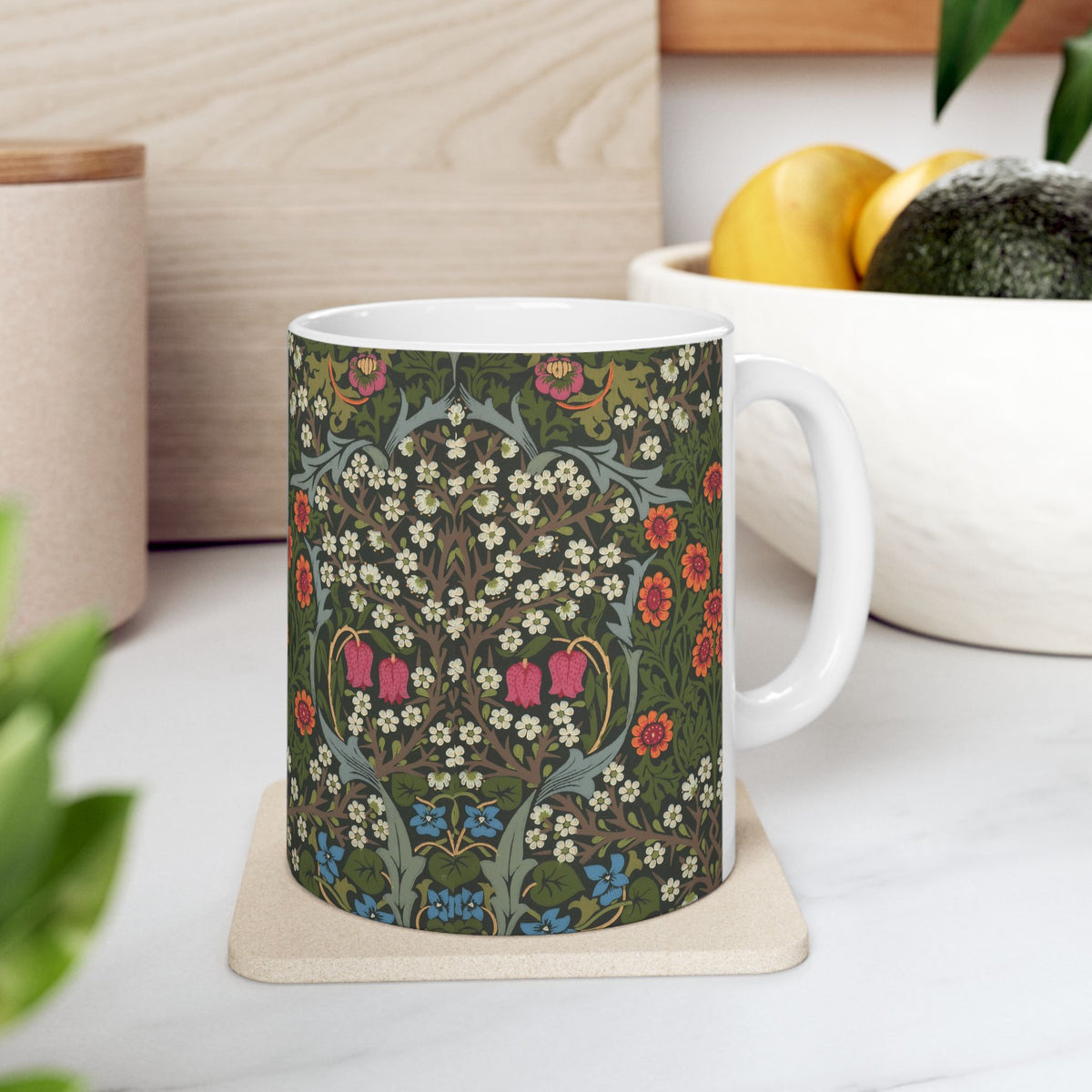 Ceramic Mug designed by William Morris & Co in a green, white and pink floral pattern called Blackthorn Collection