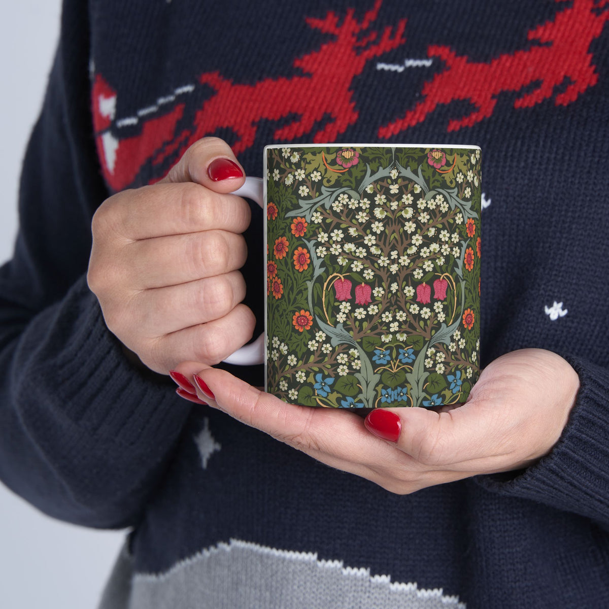 Ceramic Mug designed by William Morris & Co in a green, white and pink floral pattern called Blackthorn Collection