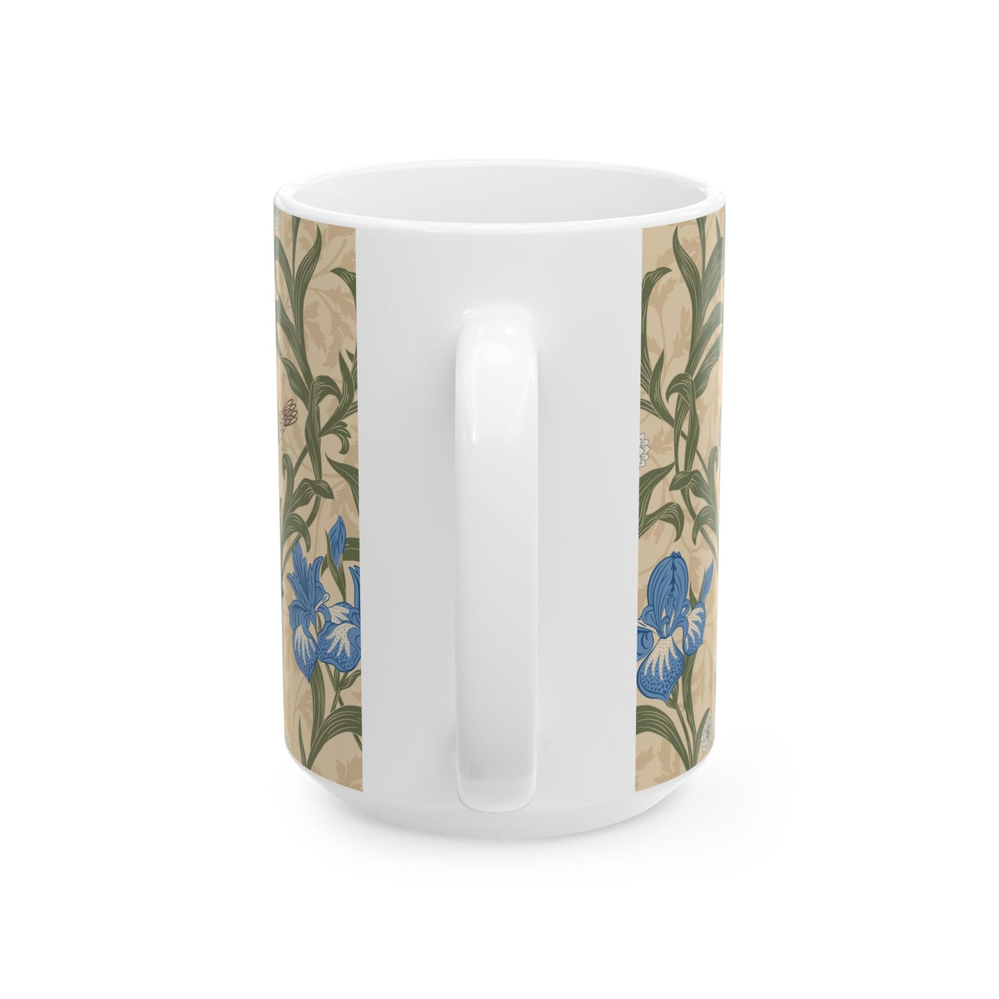 A ceramic mug with a floral William Morris & Co pattern design, featuring a bird and various flowers in shades of blue, green and beige.