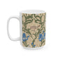 A ceramic mug with a floral William Morris & Co pattern design, featuring a bird and various flowers in shades of blue, green and beige.