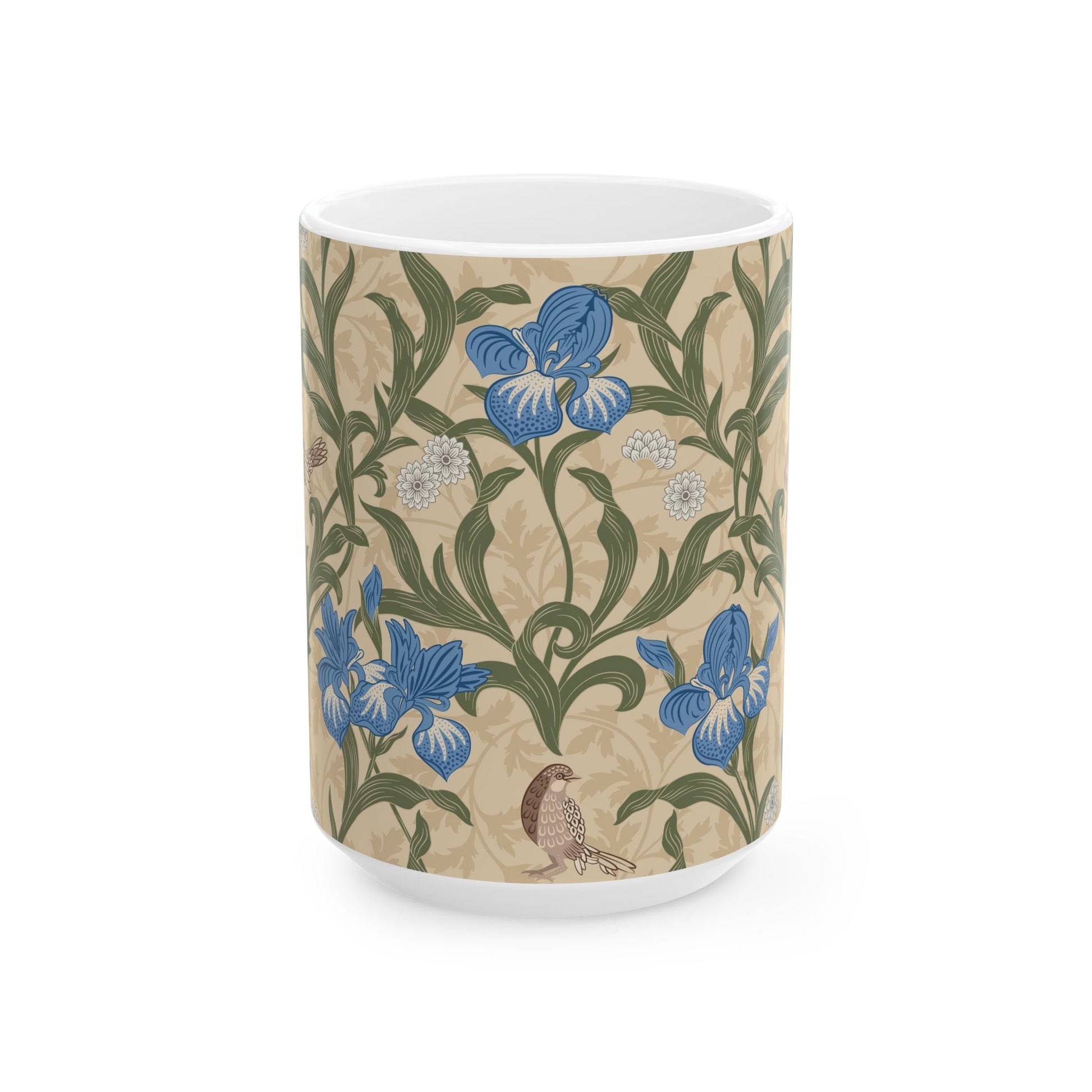 A ceramic mug with a floral William Morris & Co pattern design, featuring a bird and various flowers in shades of blue, green and beige.