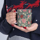 A ceramic mug with a floral pattern inspired by William Morris - Cray Collection.