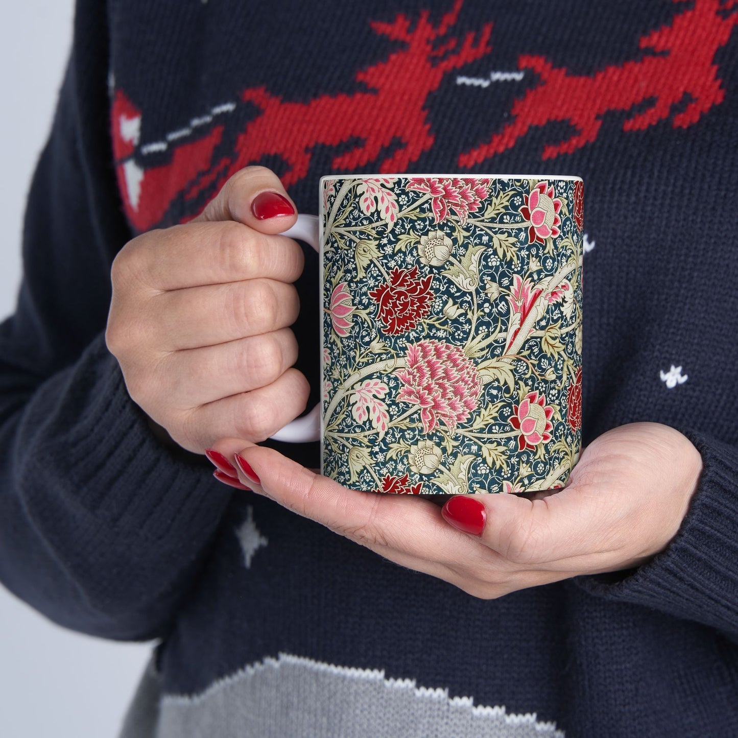 A ceramic mug with a floral pattern inspired by William Morris - Cray Collection.