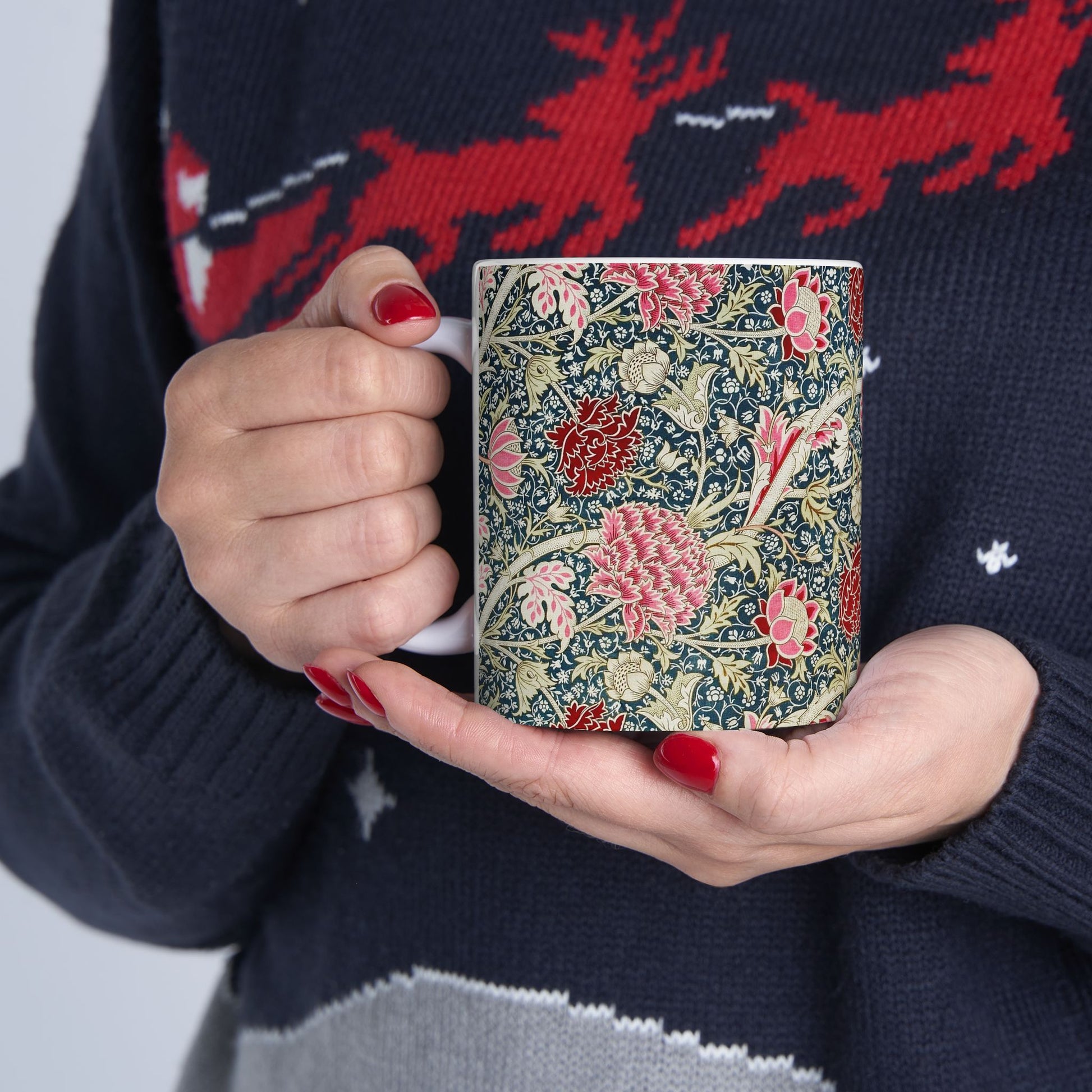A ceramic mug with a floral pattern inspired by William Morris - Cray Collection.