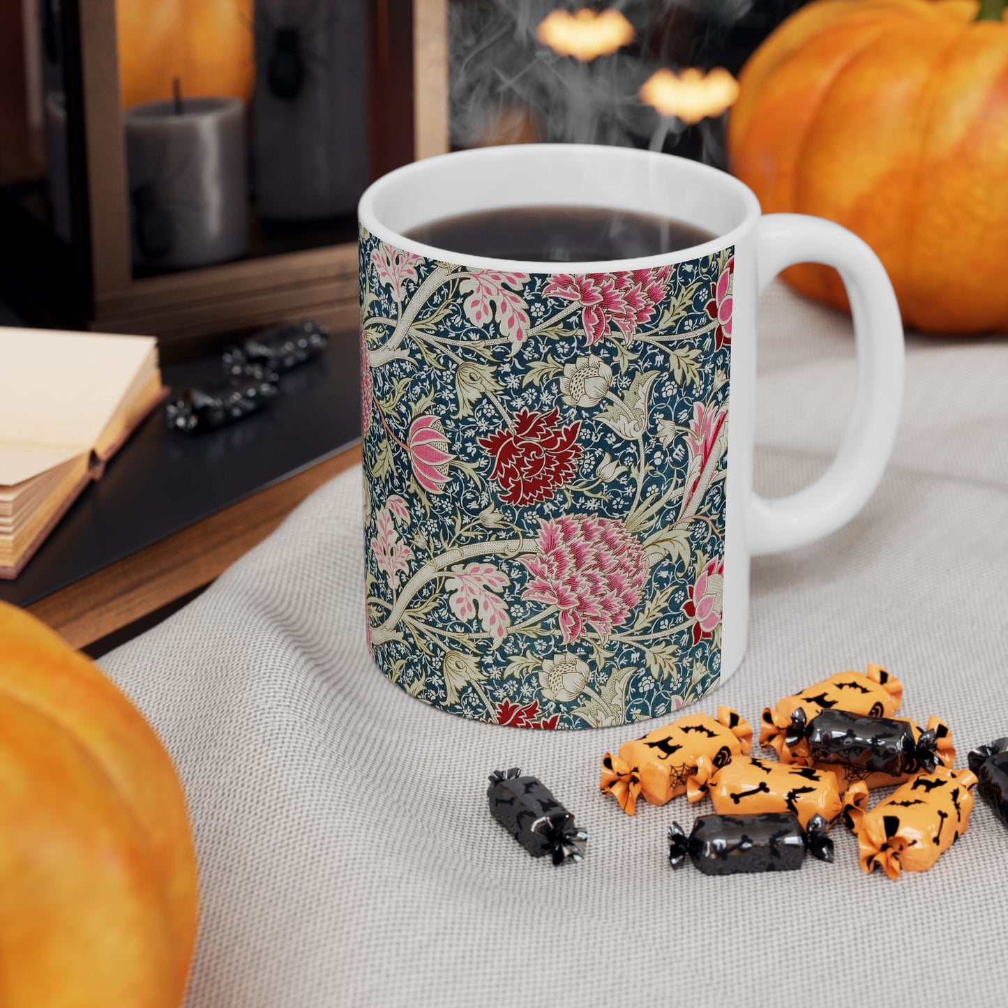 A ceramic mug with a floral pattern inspired by William Morris - Cray Collection.