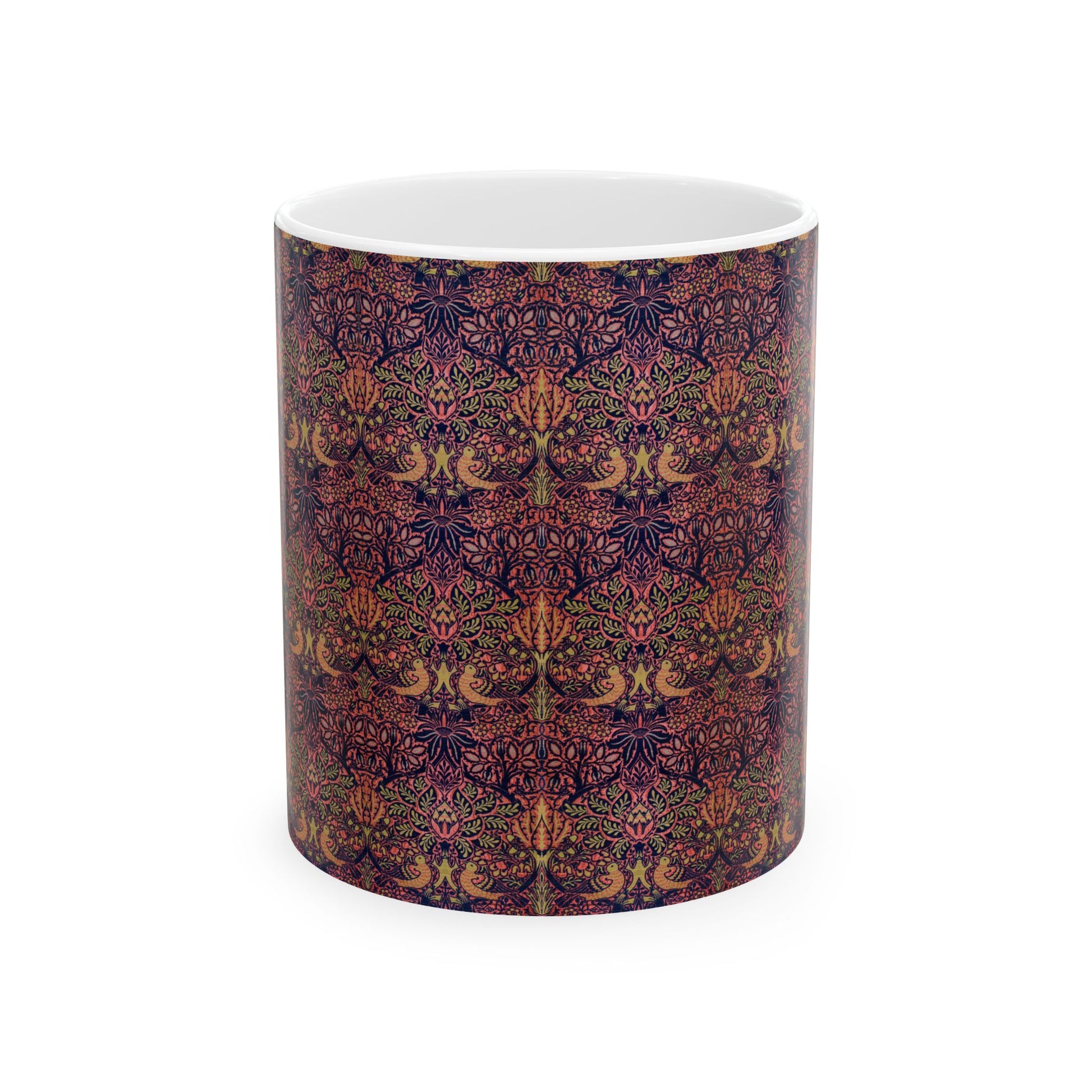 A ceramic mug with a floral pattern inspired by William Morris's artistry, featuring a white base and a shiny finish.