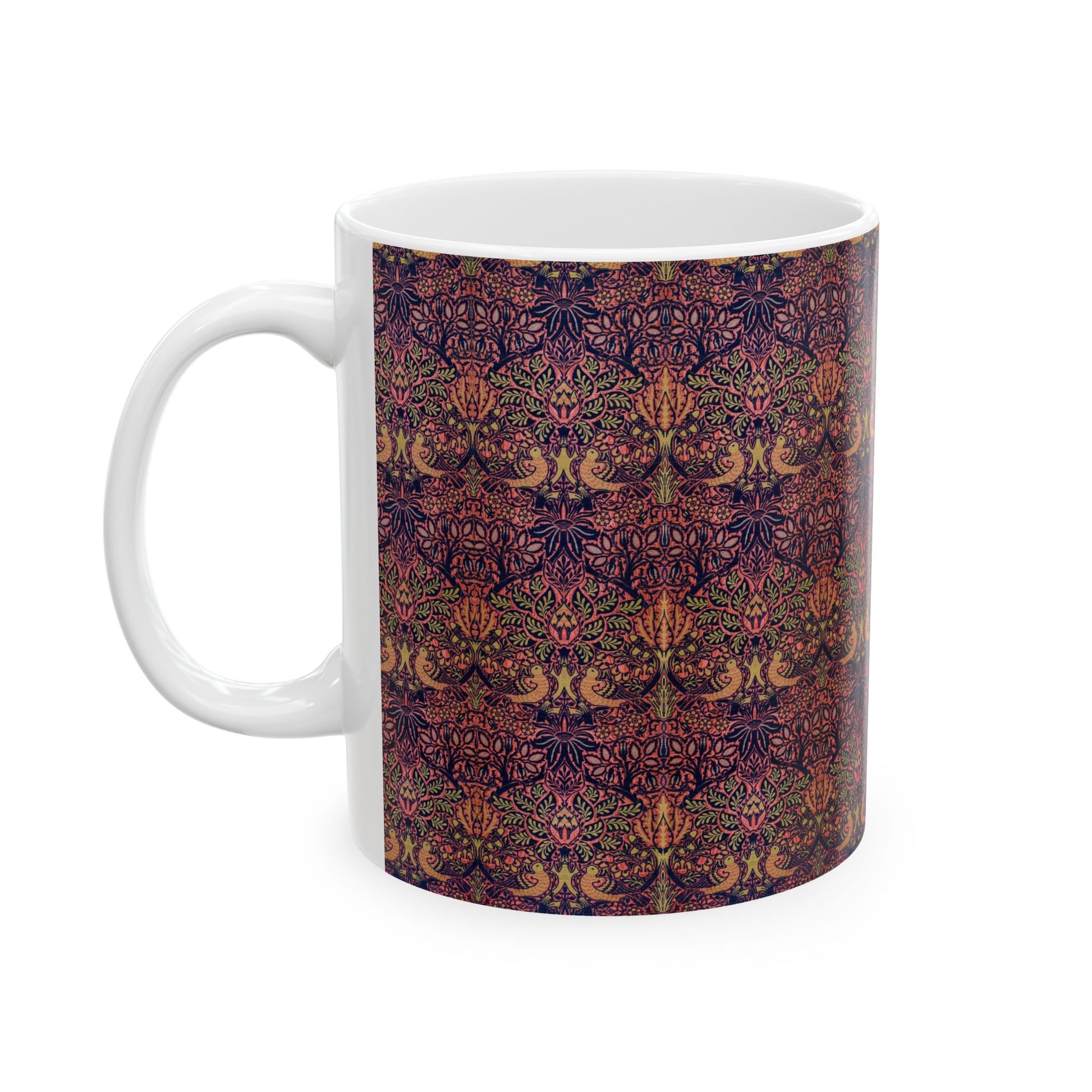 A ceramic mug with a floral pattern inspired by William Morris's artistry, featuring a white base and a shiny finish.