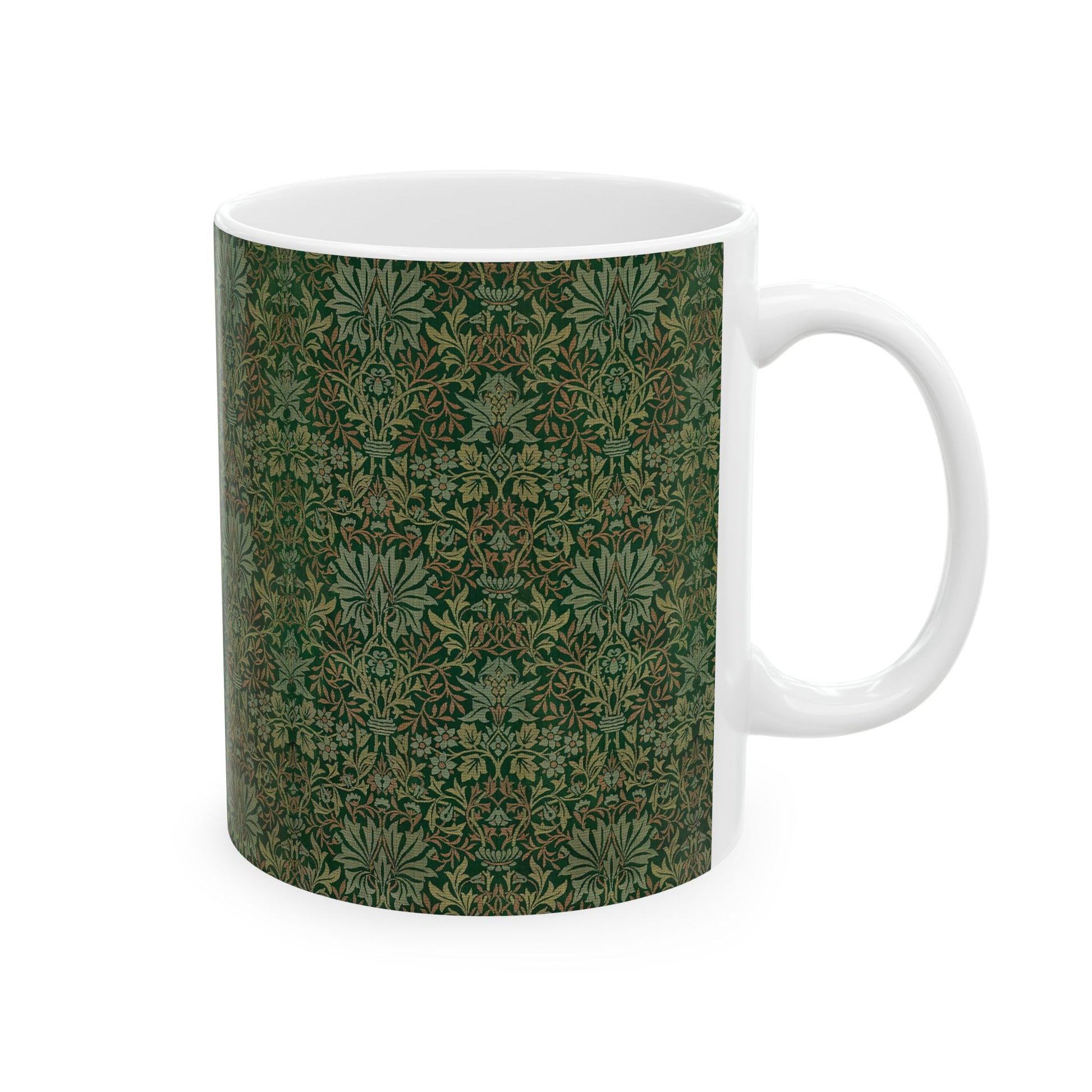A ceramic mug with a floral garden William Morris & Co pattern design, predominantly green and white.