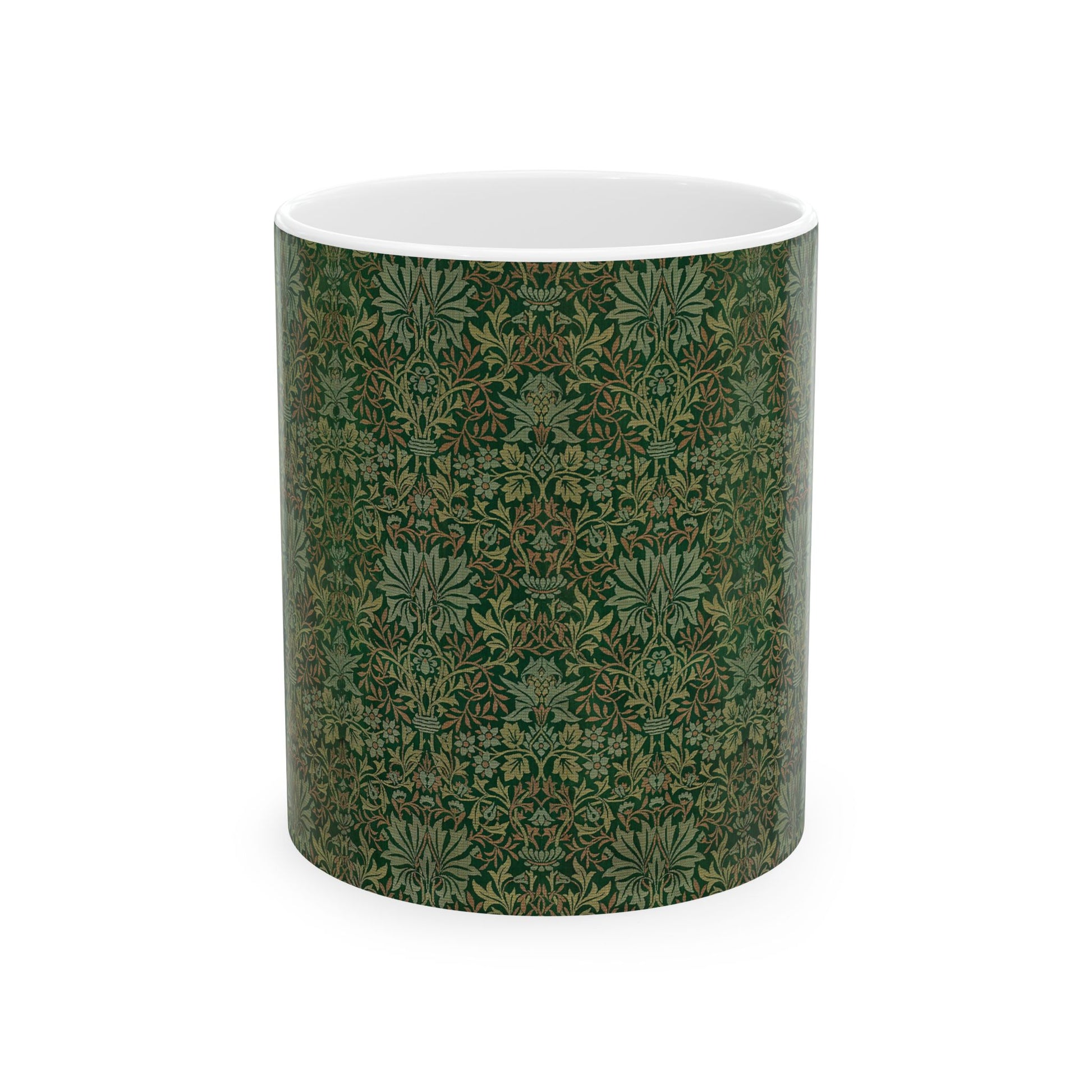 A ceramic mug with a floral garden William Morris & Co pattern design, predominantly green and white.