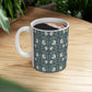 A ceramic mug with a floral pattern inspired by William Morris - Pimpernel Collection in a slate colour.