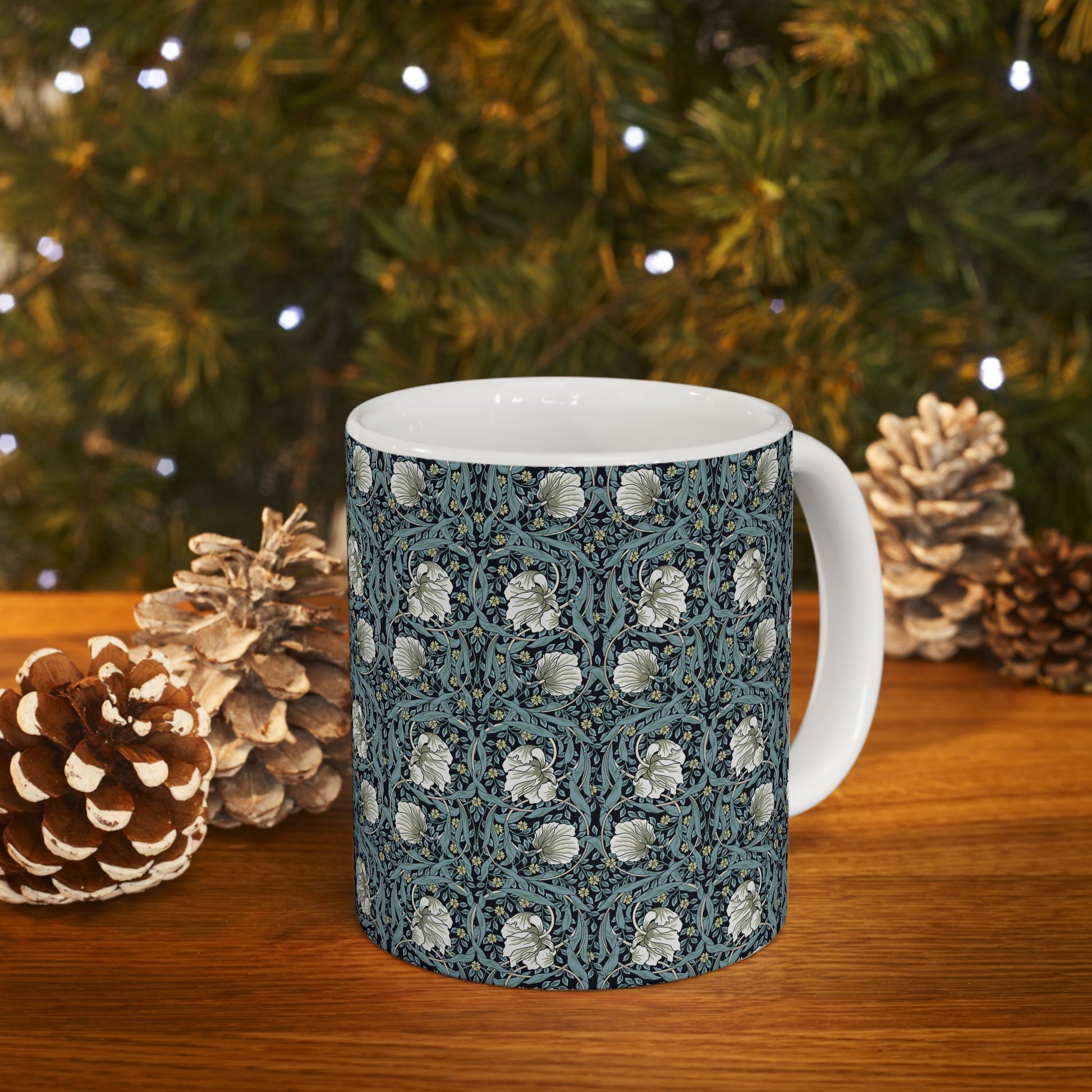 A ceramic mug with a floral pattern inspired by William Morris - Pimpernel Collection in a slate colour.