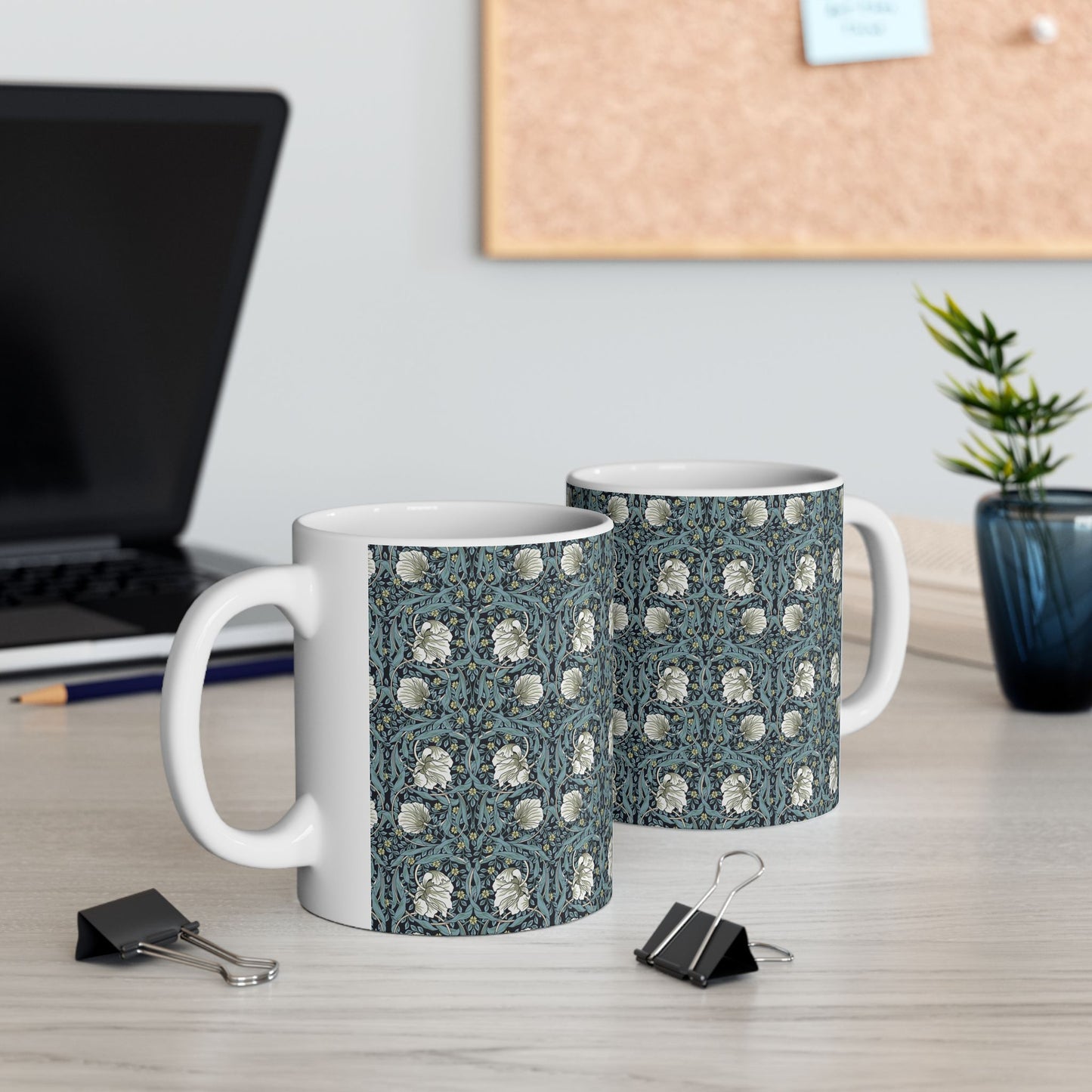 A ceramic mug with a floral pattern inspired by William Morris - Pimpernel Collection in a slate colour.