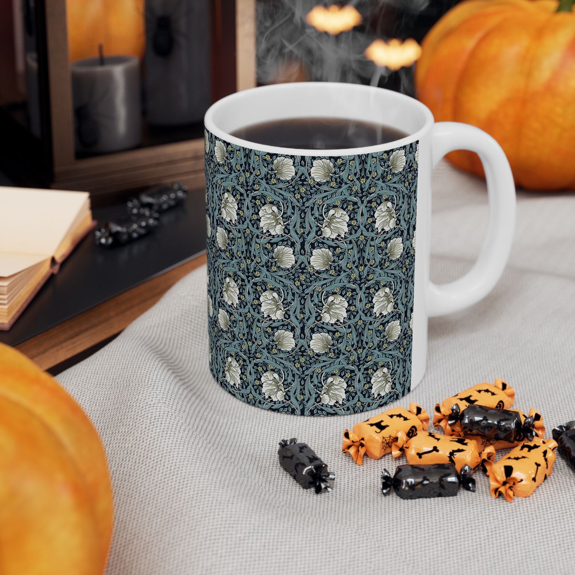 A ceramic mug with a floral pattern inspired by William Morris - Pimpernel Collection in a slate colour.