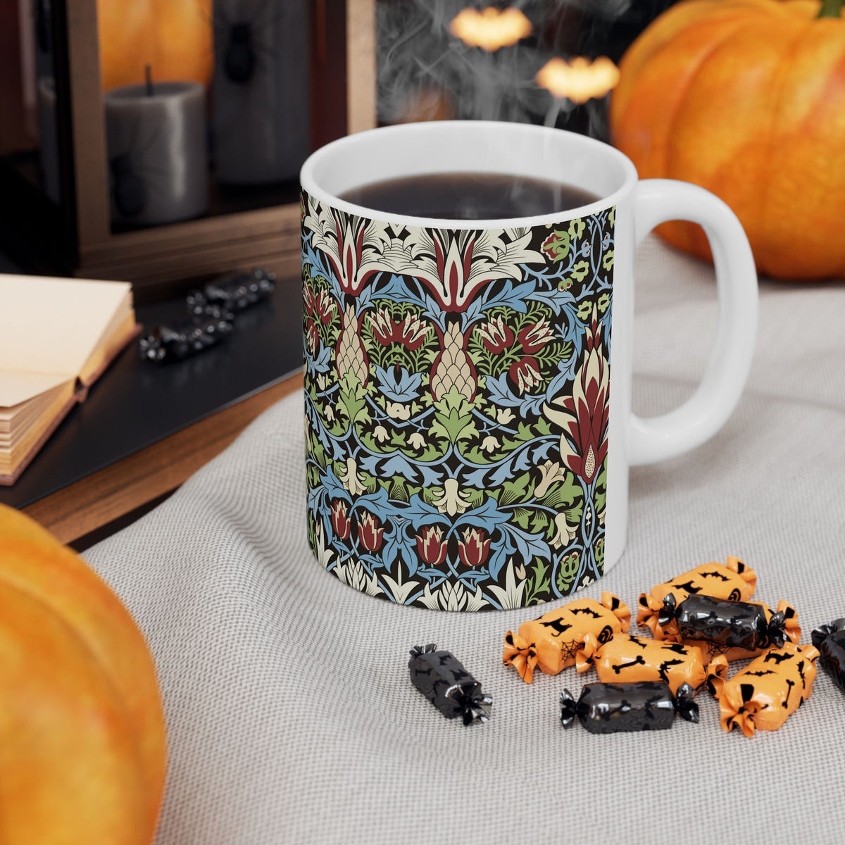 A ceramic mug with a floral and geometric pattern inspired by William Morris  & Co in a floral pattern called Snakeshead Collection.