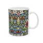 A ceramic mug with a floral and geometric pattern inspired by William Morris  & Co in a floral pattern called Snakeshead Collection.