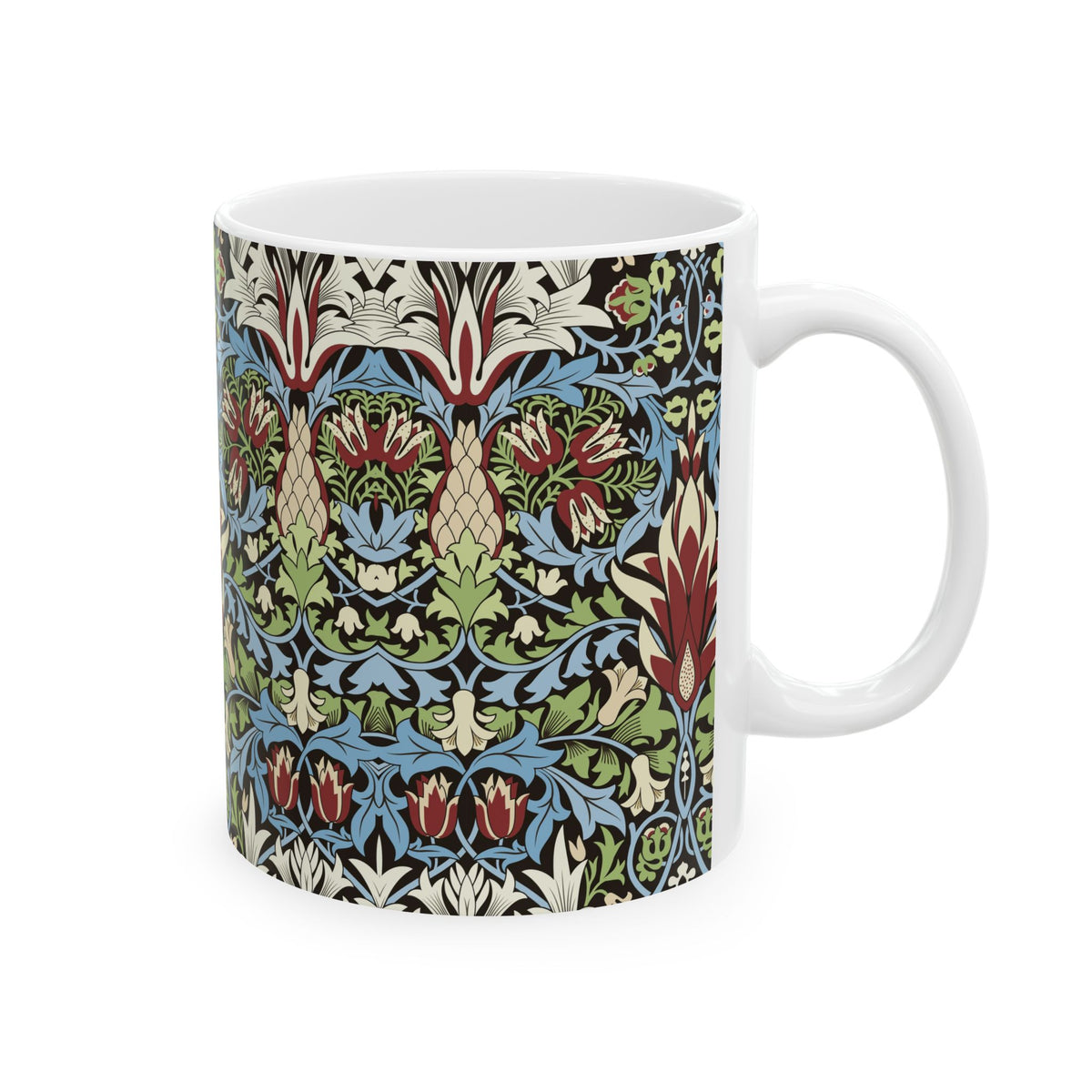 A ceramic mug with a floral and geometric pattern inspired by William Morris  & Co in a floral pattern called Snakeshead Collection.