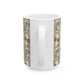 A white ceramic mug with a vertical wrap-around print featuring a vintage-style floral trellis pattern in muted red, blue, green, and beige tones, shown on a clean white background.