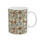 A white ceramic mug featuring a vintage-style floral trellis pattern with red flowers, green leaves, and blue butterflies on a beige background.