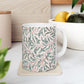 Ceramic Mug designed by William Morris & Co in a green and white floral pattern called Willow Bough Collection