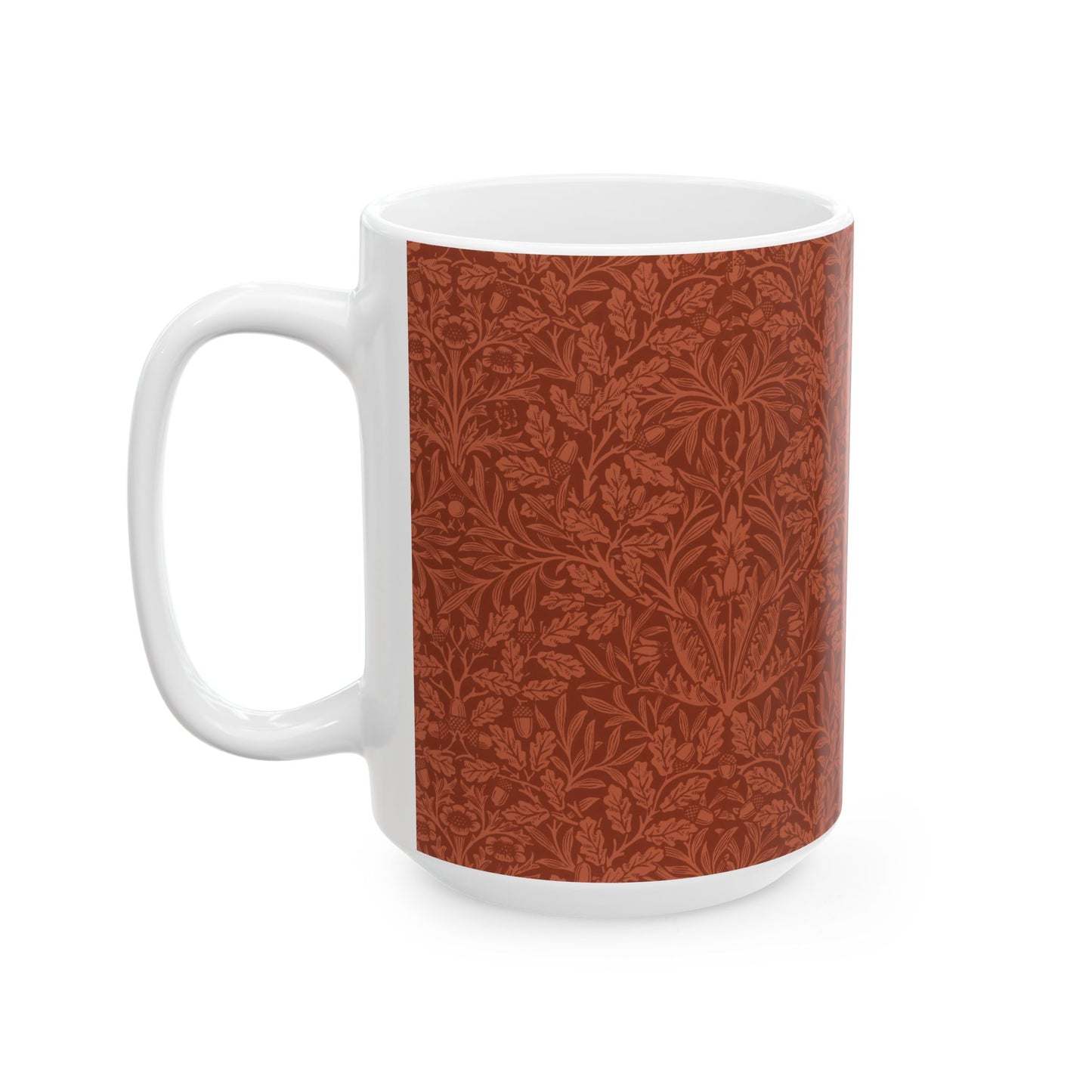 A ceramic mug with a rust-coloured floral pattern inspired by William Morris - Acorns & Oak Leaves Collection.