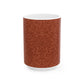 A ceramic mug with a rust-coloured floral pattern inspired by William Morris - Acorns & Oak Leaves Collection.