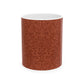 A ceramic mug with a rust-coloured floral pattern inspired by William Morris - Acorns & Oak Leaves Collection.