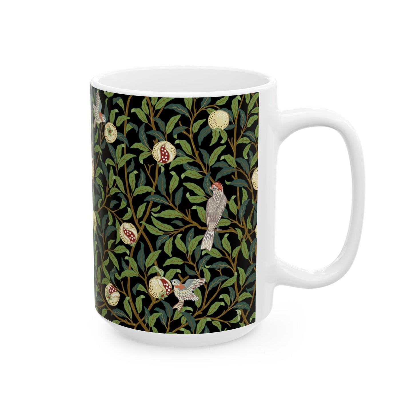 A ceramic mug with a black background featuring a floral William Morris & Co pattern of birds and pomegranates.