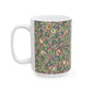 A white ceramic mug with a pink floral and pomegranate design inspired by William Morris.