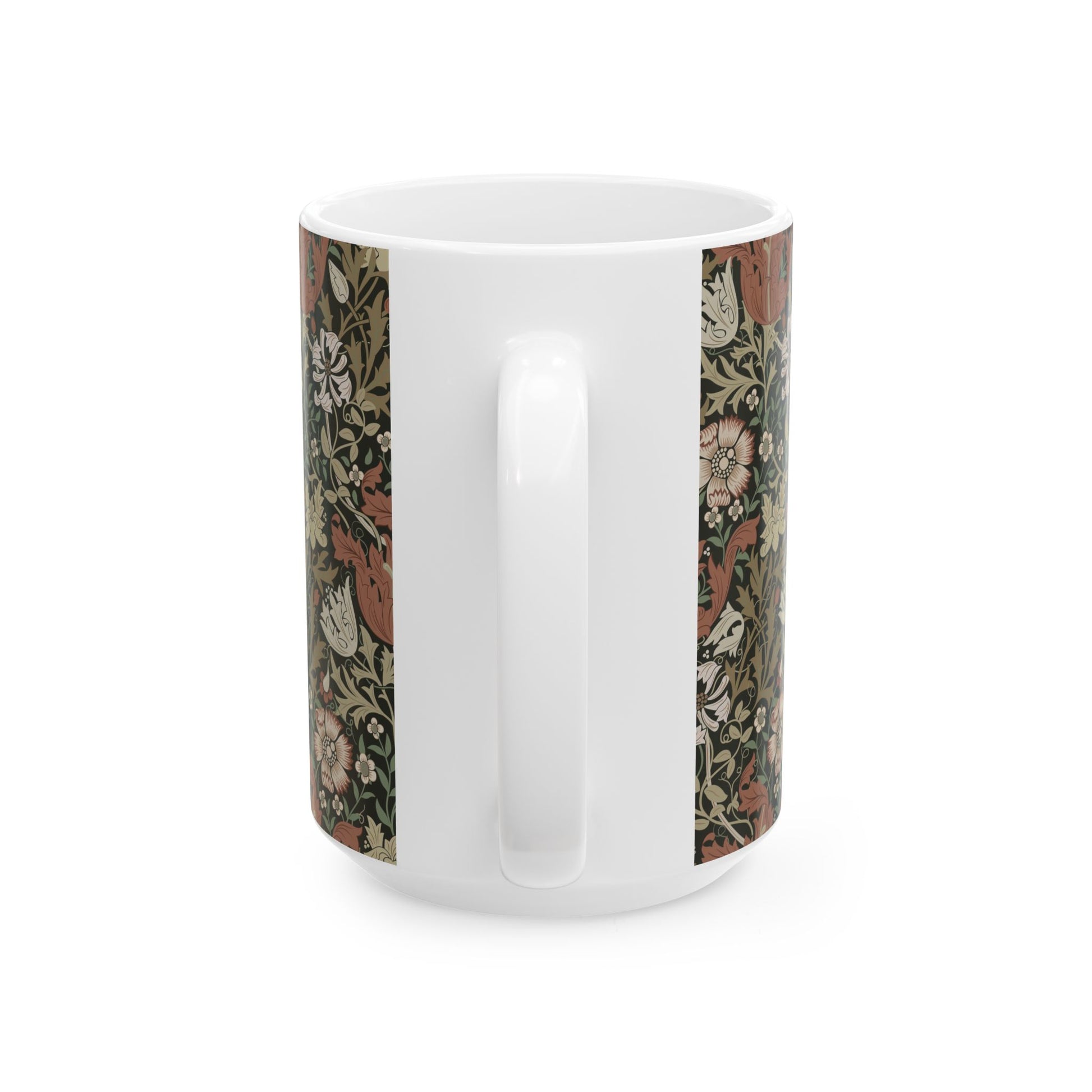 A white ceramic mug with a floral Arts & Crafts pattern called Compton which was inspired by William Morris & Co