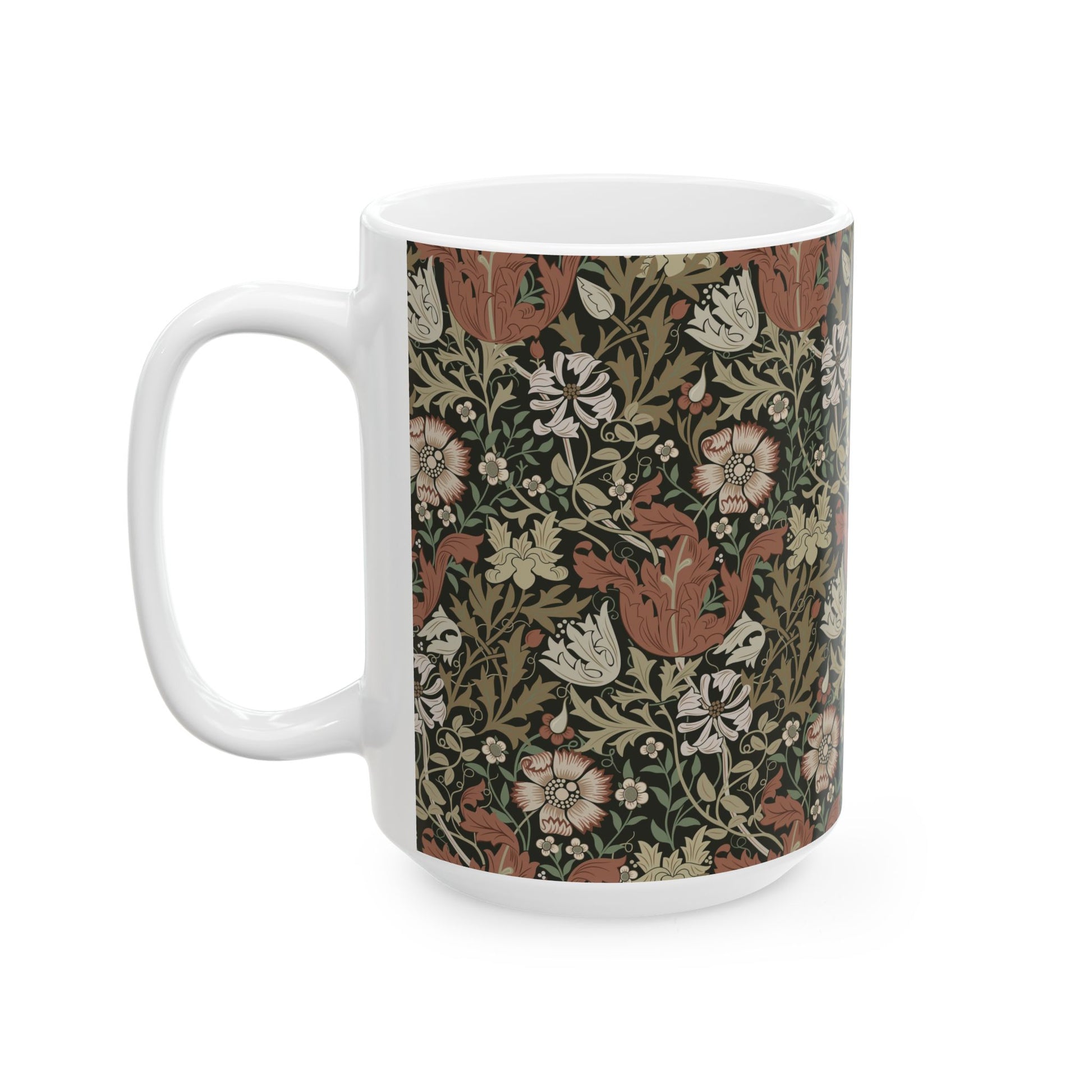 A white ceramic mug with a floral Arts & Crafts pattern called Compton which was inspired by William Morris & Co