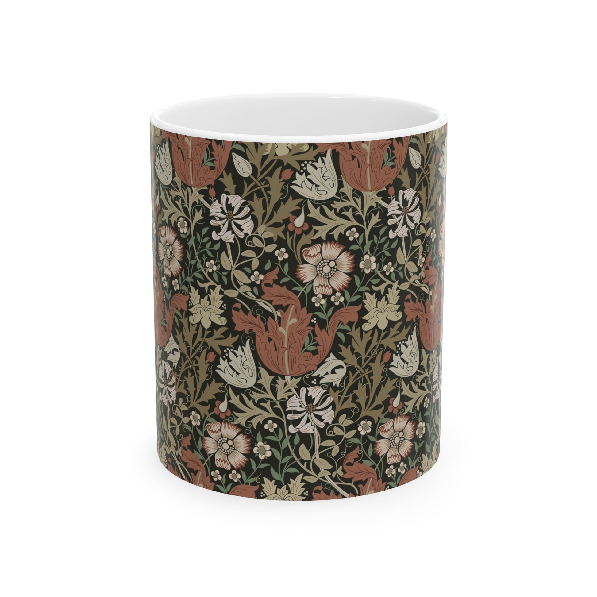 A white ceramic mug with a floral Arts & Crafts pattern called Compton which was inspired by William Morris & Co