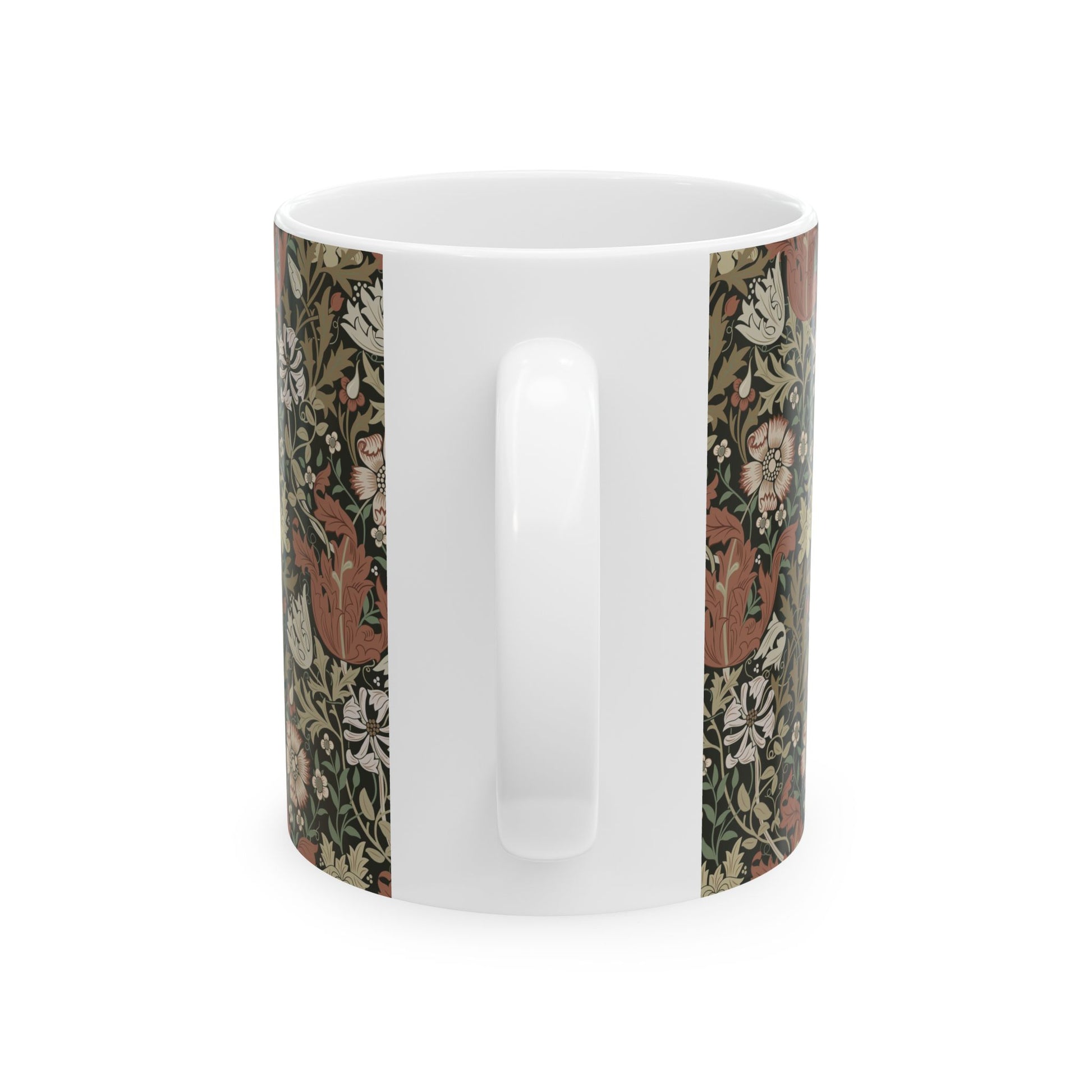 A white ceramic mug with a floral Arts & Crafts pattern called Compton which was inspired by William Morris & Co
