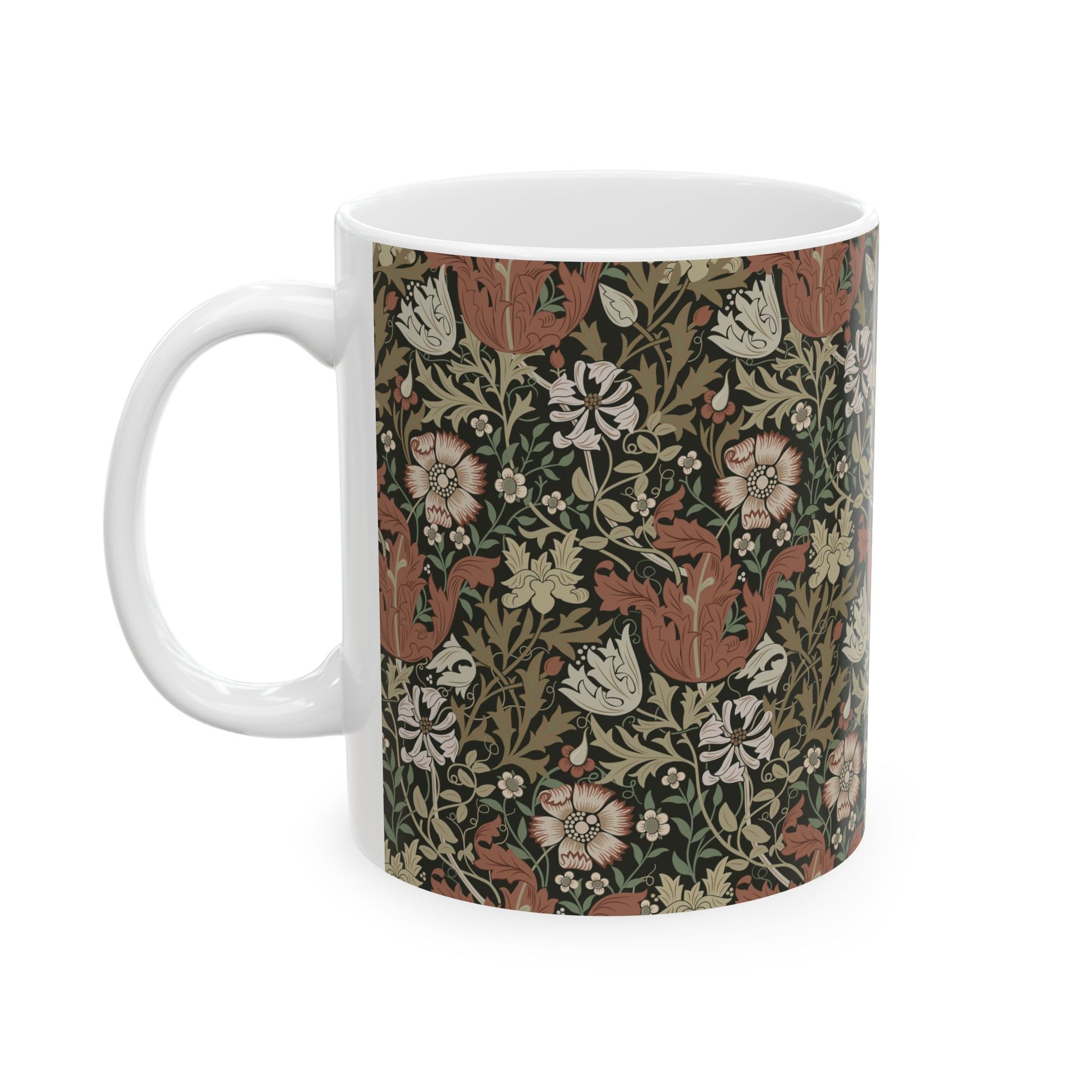 A white ceramic mug with a floral Arts & Crafts pattern called Compton which was inspired by William Morris & Co
