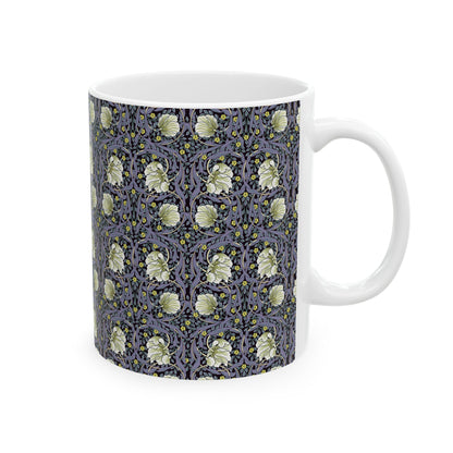 A ceramic mug with a floral pattern inspired by William Morris - Pimpernel Collection in lavender colour.