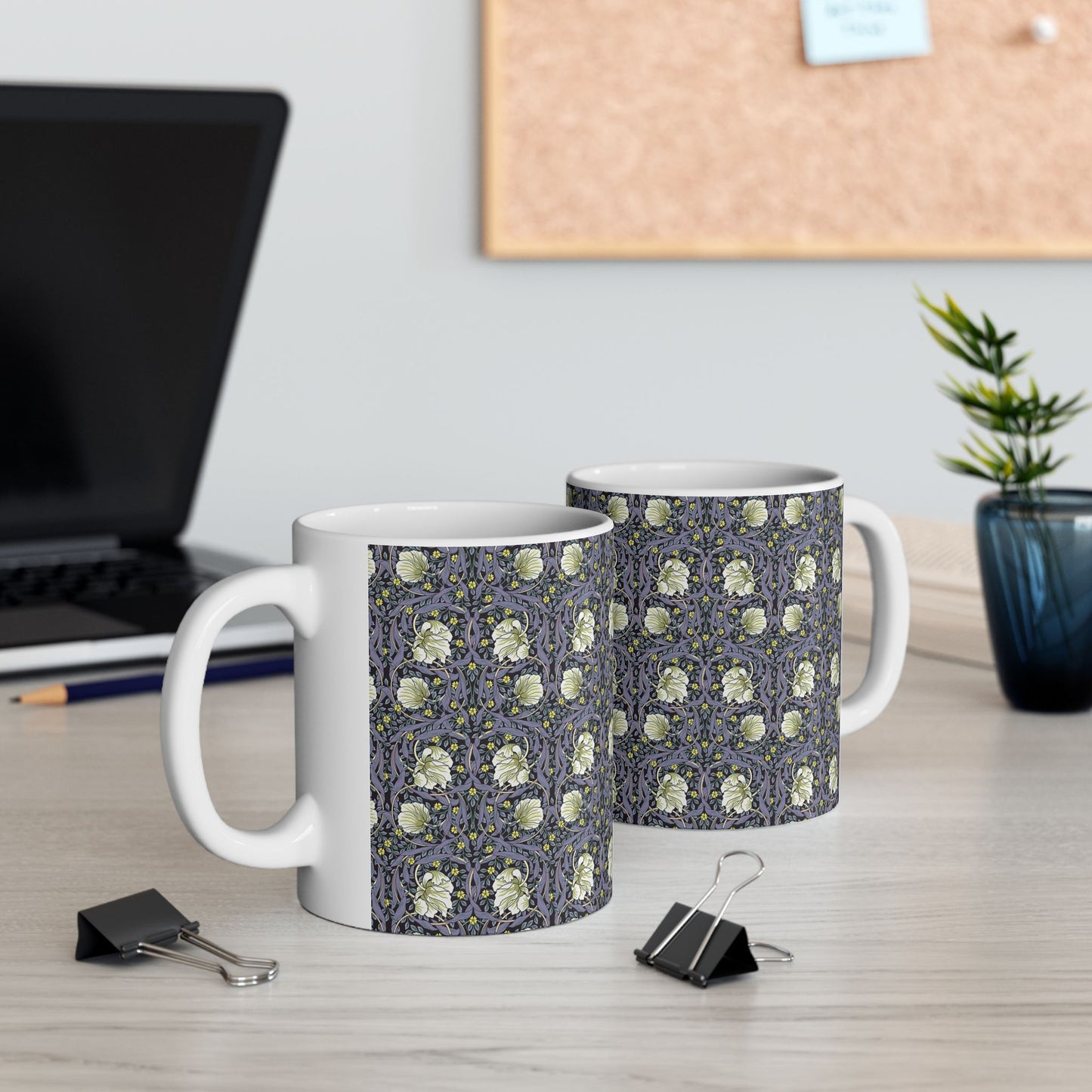 A ceramic mug with a floral pattern inspired by William Morris - Pimpernel Collection in lavender colour.
