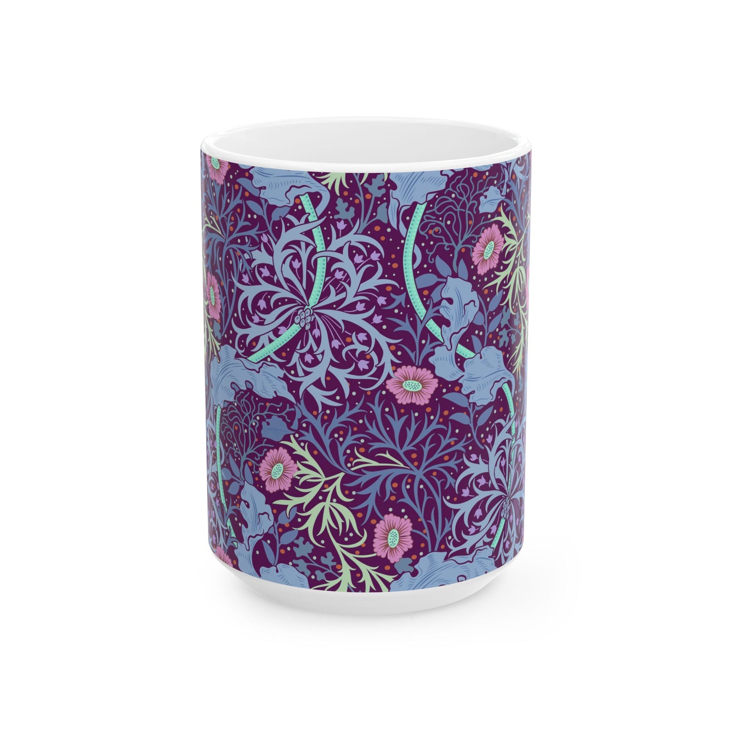 A white ceramic mug with a pink floral pattern inspired by William Morris.