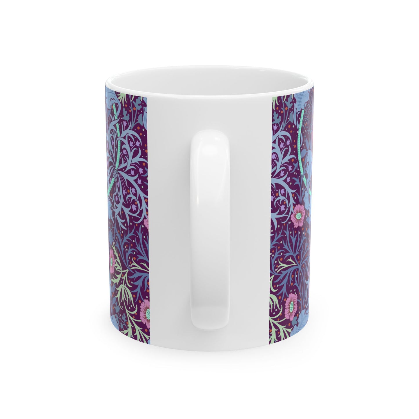 A white ceramic mug with a pink floral seaweed pattern inspired by William Morris.