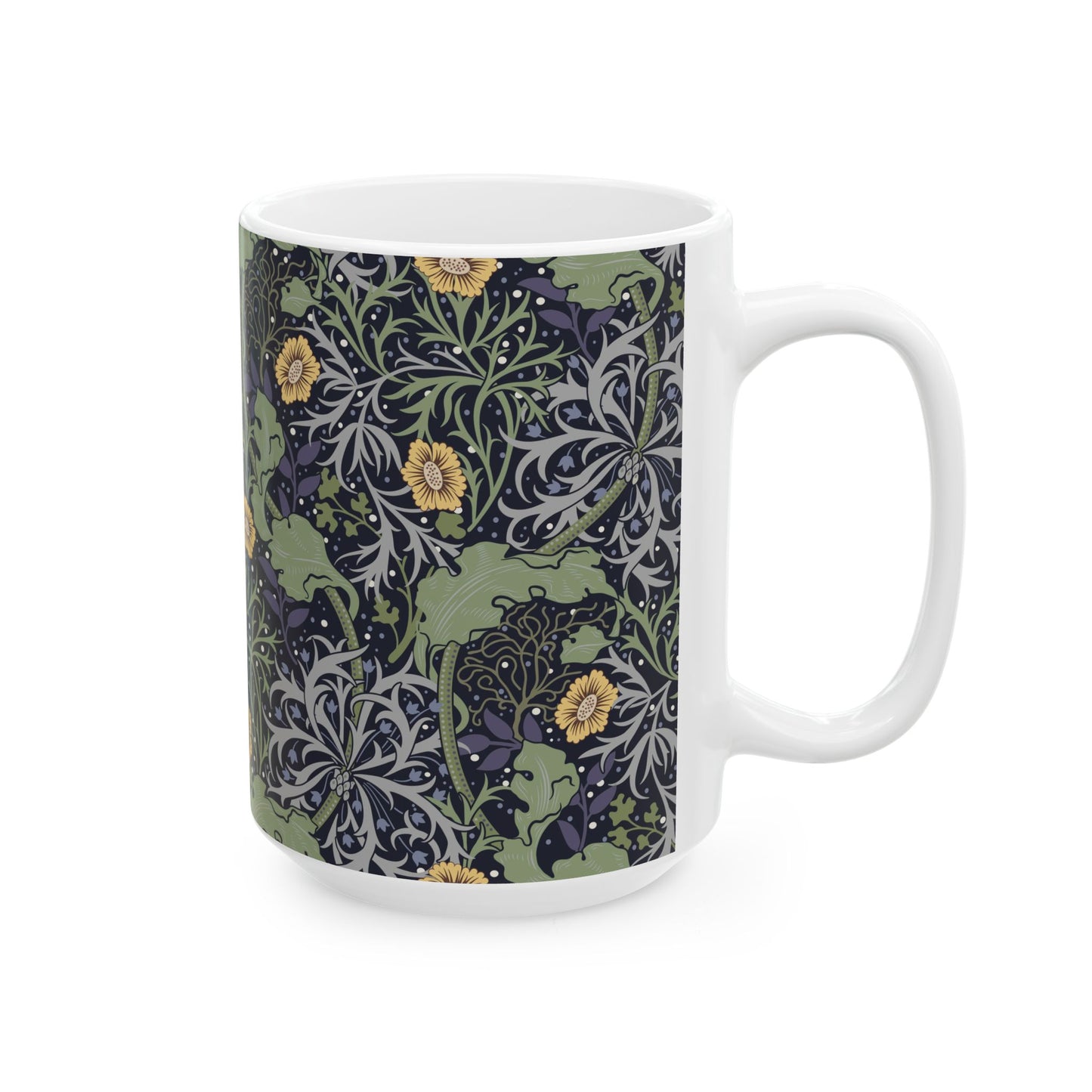 A white ceramic mug with a yellow and green floral pattern from the Collection called Seaweed inspired by William Morris.
