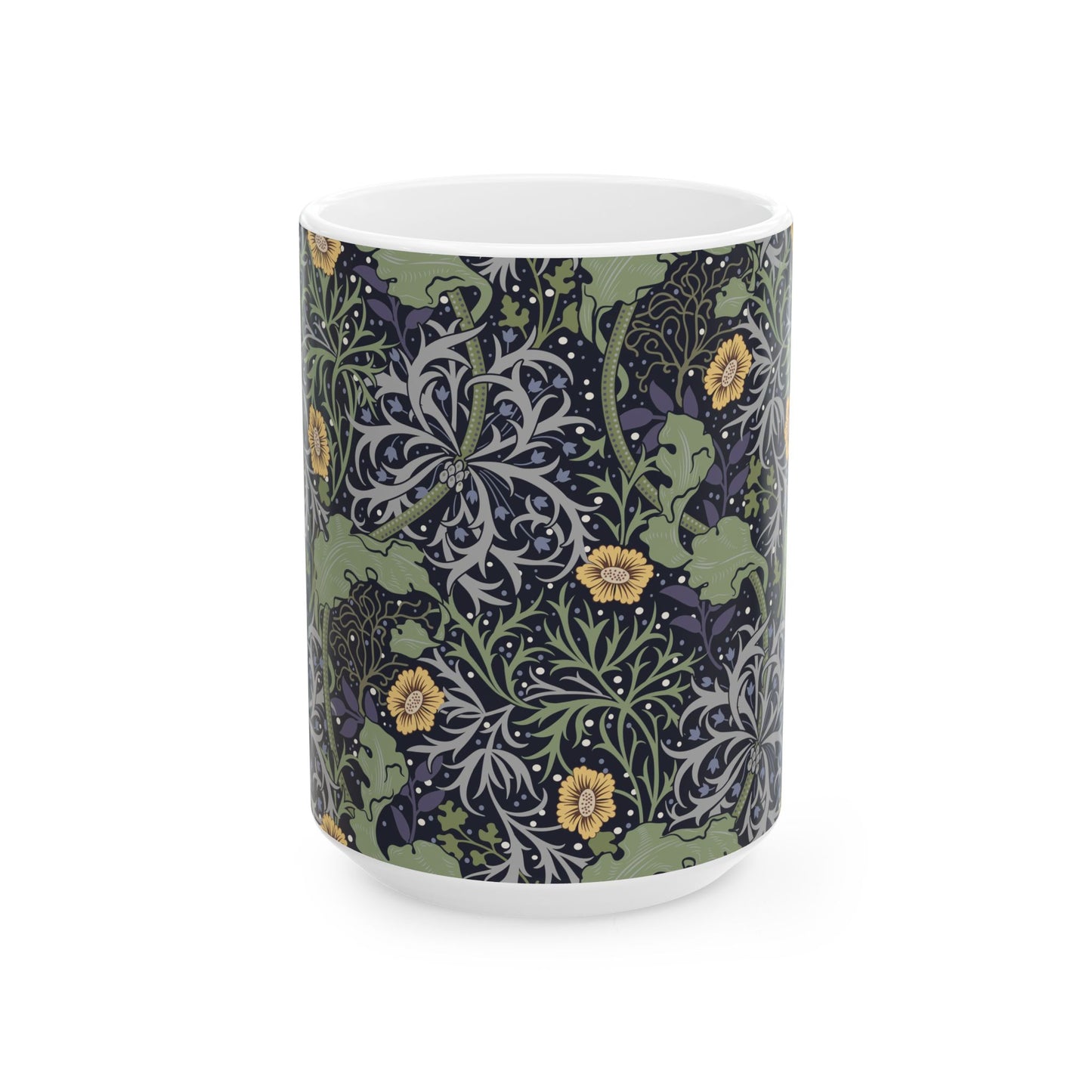 A white ceramic mug with a yellow and green floral pattern from the Collection called Seaweed inspired by William Morris.