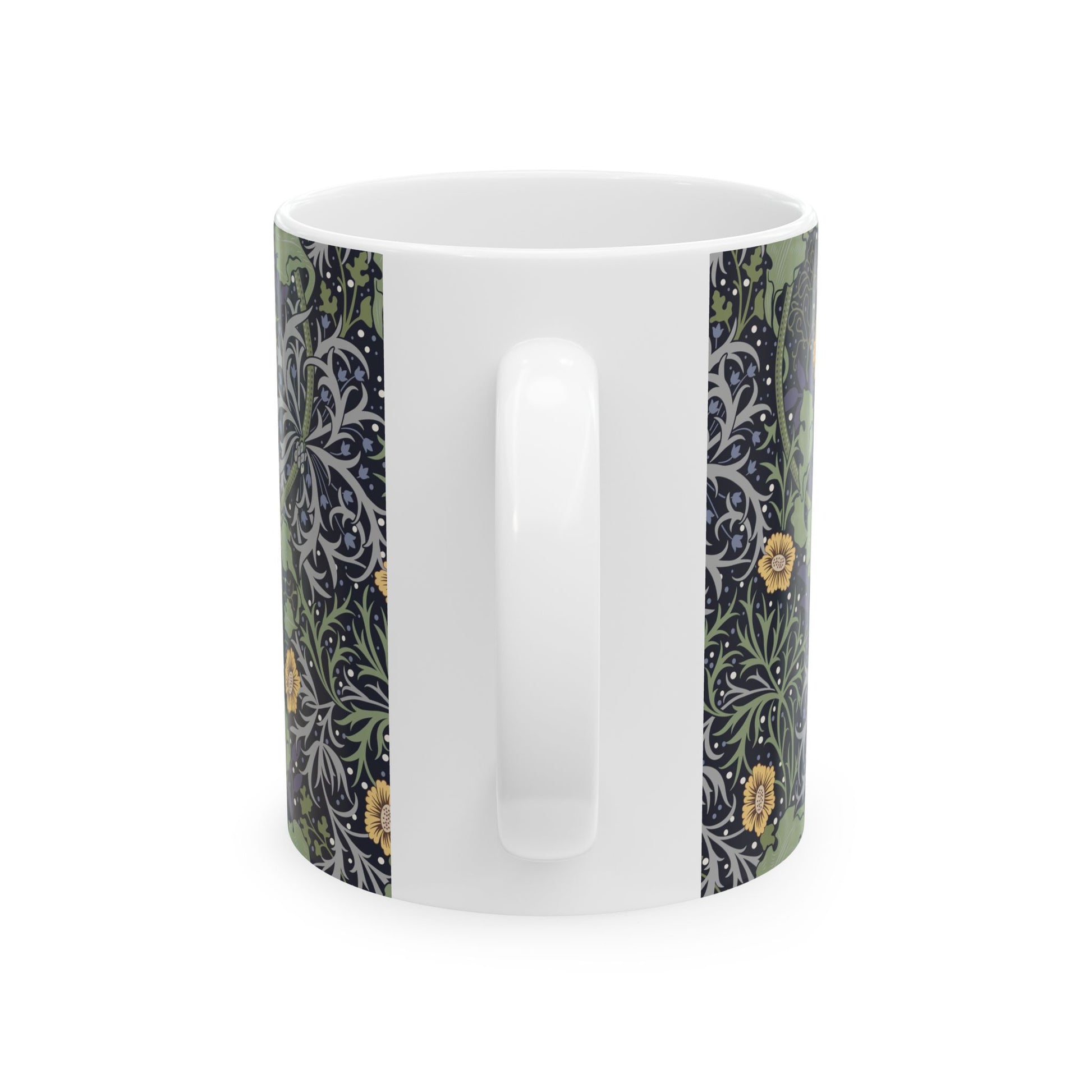 A white ceramic mug with a yellow and green floral pattern from the Collection called Seaweed inspired by William Morris.