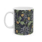 A white ceramic mug with a yellow and green floral pattern from the Collection called Seaweed inspired by William Morris.